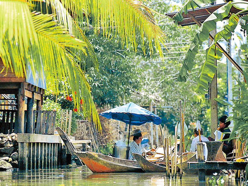 Teil Ihrer Asien Rundreise in Bangkok: Bootsfahrt auf den Klongs