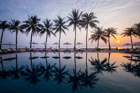 Abendstimmung am Pool des Hotel Victoria Hoi An, Vietnam Rundreise